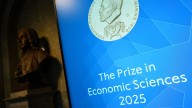 Why is the Nobel in Economics called Sveriges Riksbank Prize?