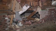 Police chase ends in car slamming into East St. Louis home