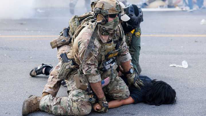 Using helicopters and chemical agents, immigration agents become increasingly aggressive in Chicago