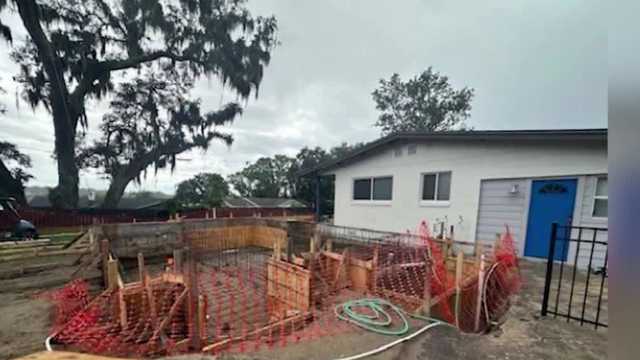 Front yard pool sparks dispute between longtime Florida neighbors