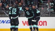 Marchment scores in Seattle debut as Kraken win season opener for first time