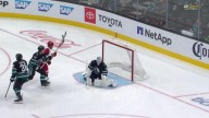 Carrier, Robinson score late in 2nd period and Hurricanes beat Shar...