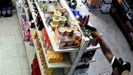Video captures man opening fire at LAPD cops inside liquor store
