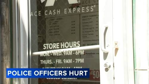 4 Philadelphia officers hurt during arrest of robbery suspect at check