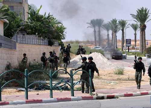 Red Cross begins transfer of hostages under Israel