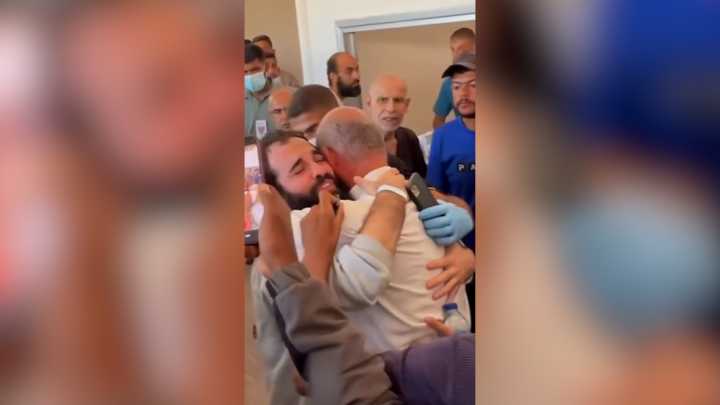 Gaza journalist buried as brother is freed from Israeli prison