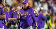 LSU athletic director Scott Woodward resigns, 4 days after the firing of football coach Brian Kelly