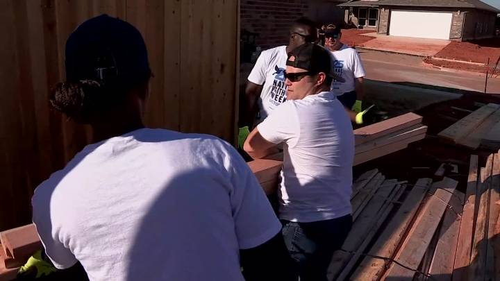 OCPD sends over 50 officers to help build home for family in need