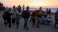 Palestinians journey back home as aid convoys start to enter Gaza