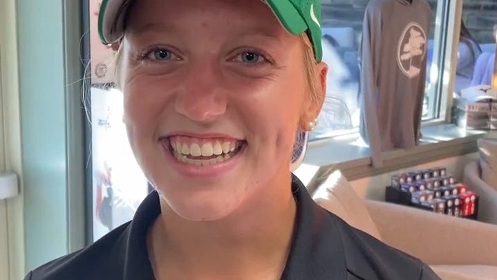 Highland's Elizabeth Coleman reacts to district tournament victory