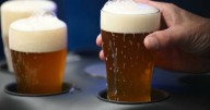UK festival dumps 7000 litres of beer after storm Amy