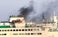 Black smoke rises from ferry docked at Bainbridge Island