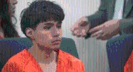 Brother of 14-year-old killed in UNM dorm will be held in jail pending his trial