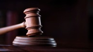 Driver charged for allegedly hitting, killing woman