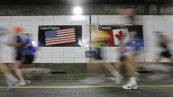 Detroit Free Press marathon runner not stopped after a car hit him