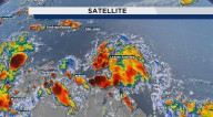 Invest 98L continues to show signs of organization