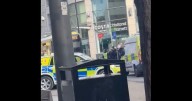 Police called over man 'lashing out with broken bottle' in Manchester city centre