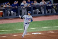 Dodgers manager Dave Roberts doesn't think slugger Shohei Ohtani heard Toronto fans' taunts