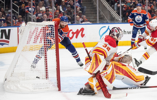 Leon Draisaitl scores his 400th NHL goal in the Oilers' opener against the Flames