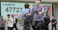 Asian shares advance and oil prices fall as Israel and Hamas agree to pause fighting