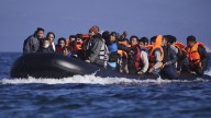 'Me again!' says returning migrant, making a little joke of it