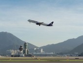 Cargo aircraft skids off Hong Kong runway, killing 2 people