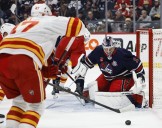 Jets use power play to soar past Flames 5