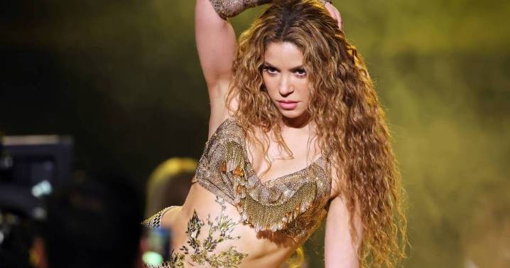 Shakira Poses While Tattooing Model, New Photo Reveals the Moment