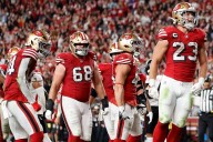 Christian McCaffrey’s 200-yard game from scrimmage powers 49ers past Falcons 20