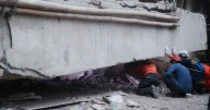Indonesian rescue workers 'racing against time' in search for dozens in rubble of collapsed school
