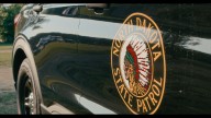 Head-on truck crash in Dunn County closes highway, injures two