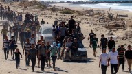 World Gaza ceasefire takes effect; forces stay put says Netanyahu