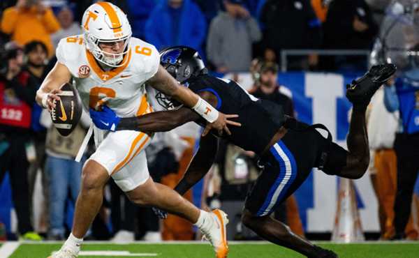 UK's Boley throws for 5 TDs, but No. 17 Vols prevail 56