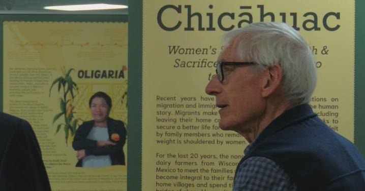Gov. Evers tours new UWEC history exhibit highlighting the families migrant workers leave behind