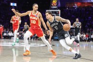 Deadspin | Hawks overcome Trae Young injury to beat winless Nets