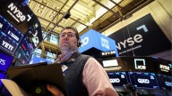 Wall Street Eases From Record Highs on Rising Economic Jitters