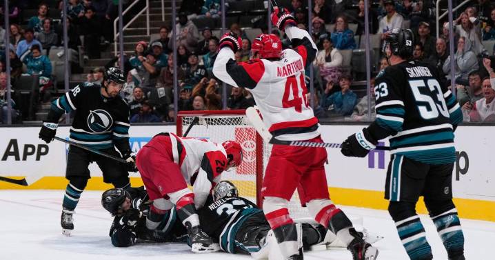 Carrier, Robinson score late in 2nd period and Hurricanes beat Sharks 5