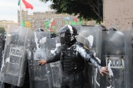 Lesionan a 95 policías en la marcha del 2 de octubre