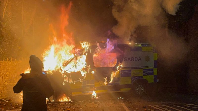 Anti-immigrant protesters burn police van in Dublin after young girl attacked