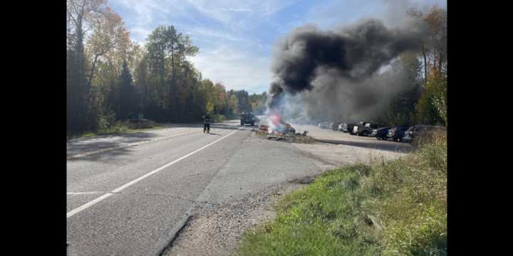 Bystanders pull crash victim from burning car in Ely