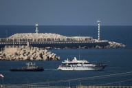 Israel intercepted a Gaza-bound flotilla carrying aid in international waters. Can it do that?