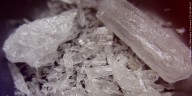 Police respond to report of man passed out, found with drugs in his possession