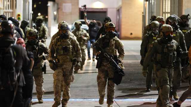 Judge temporarily blocks Trump from deploying troops in Portland