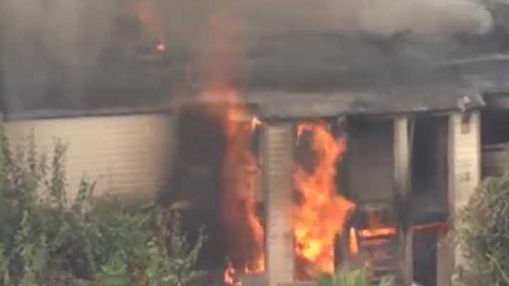 West Houston: Apartment complex catches fire, officials battle blaze