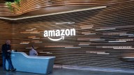 Amazon lays off thousands of corporate workers as it spends on AI : NPR