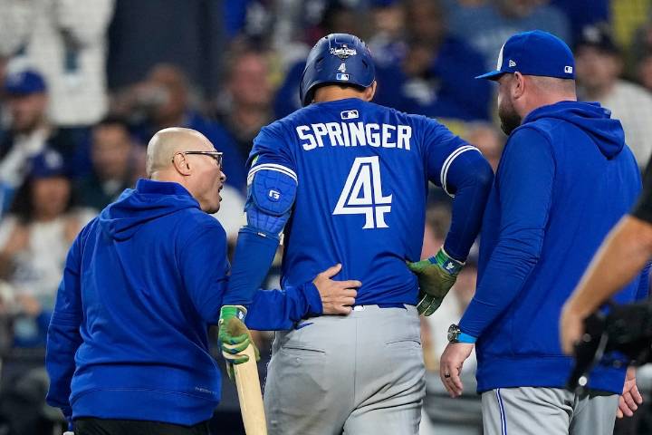 George Springer removed from Game 3 of World Series with injury