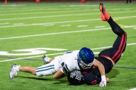 Nevada prep football: Green Valley holds off Desert Pines