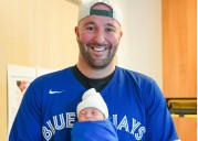 Oakville dad watches Jays historic Game 6 with newborn son in hospital