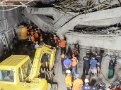Rescuers race to save survivors of Indonesia school collapse as quake hits
