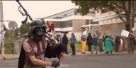 From tear gas to t-rex costumes: Portland protesters turn tension into party outside ICE building
